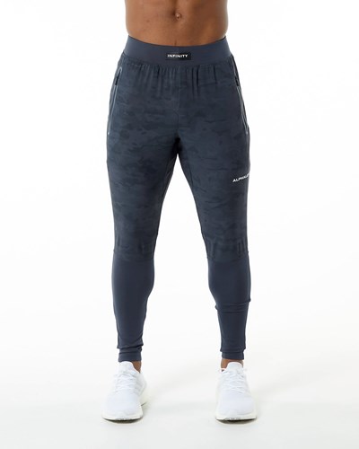 Alphalete Woven 4-Way Stretch 29" Pant Corallo | 3476-SYPGE
