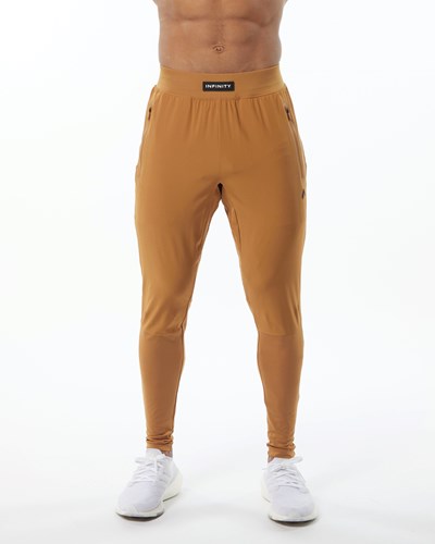 Alphalete Woven 4-Way Stretch 29" Pant Chestnut | 6738-WHJOX
