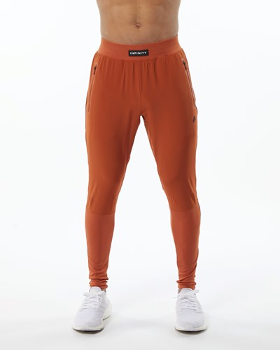 Alphalete Woven 4-Way Stretch 29" Pant Sour Tangerine | 3754-OHVNG